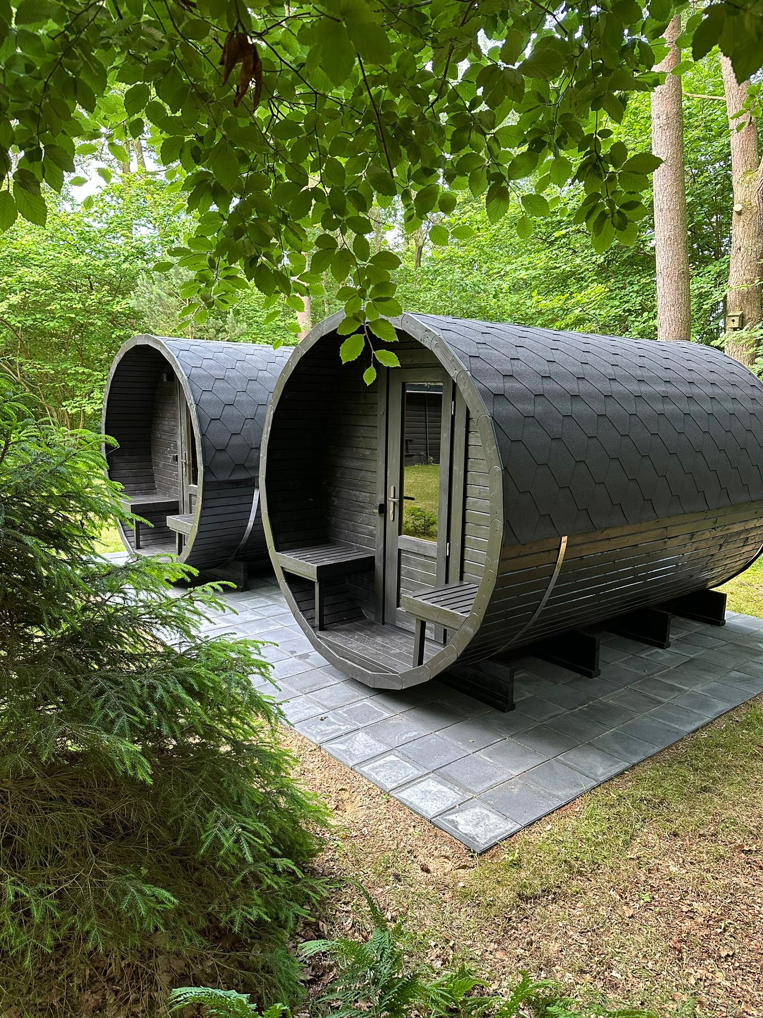 Barrel saunas installed in a customer’s garden